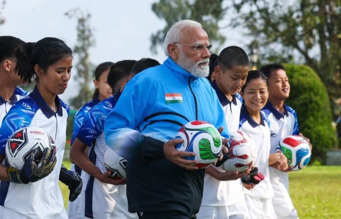 202604283767559 बच्चों संग फुटबॉल खेलते दिखे नरेंद्र मोदी, बोले- नन्हे दोस्तों के साथ खेलने का मजा ही कुछ और है PM Modi football with kids